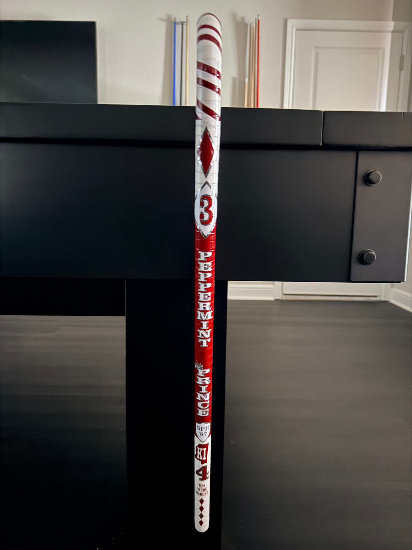 Peppermint Prince — red and white candy stripe signature kane